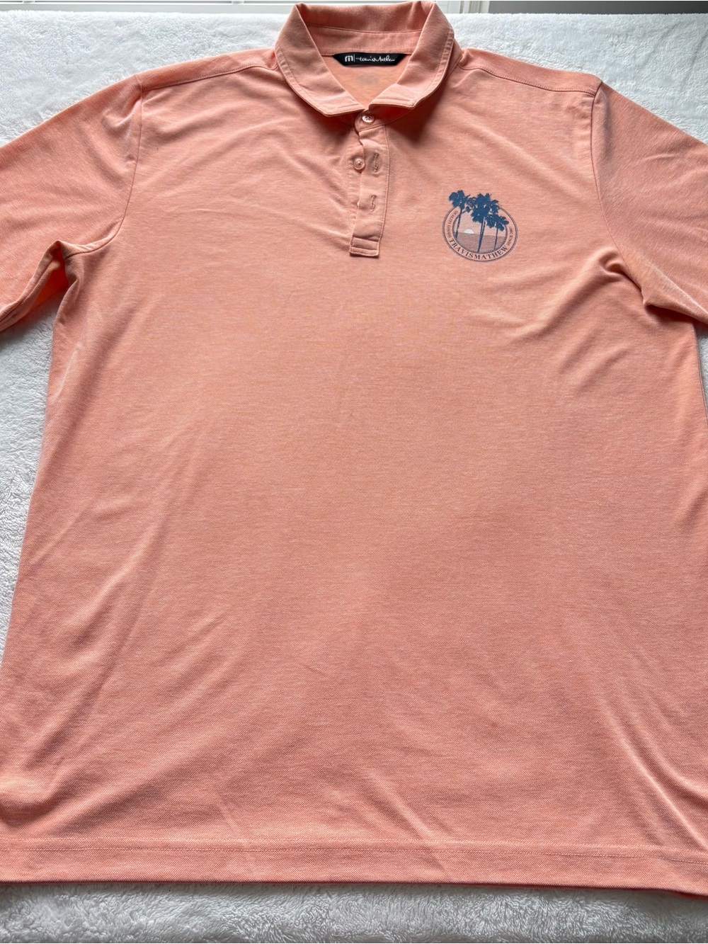 Travis Mathew Men's Coral Polo with Navy Palm Logo